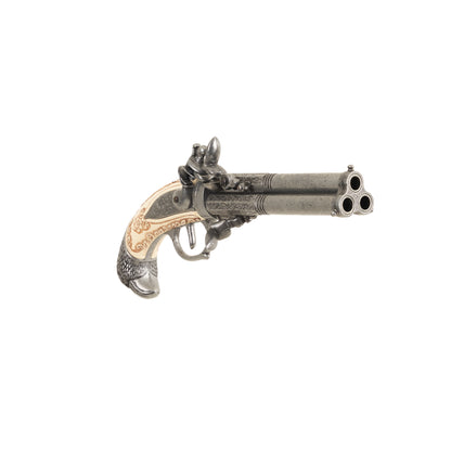 Front view of Replica 1775 Triple-Barrel Flintlock Pistol with carved faux ivory grip that ends in a pewter carved eagle's head. Decorative trigger guard, hammer, frizzen and barrels. 