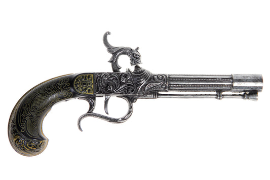 Right hand side of percussion pistol showing ornate carvings on butt end and on firing mechanism