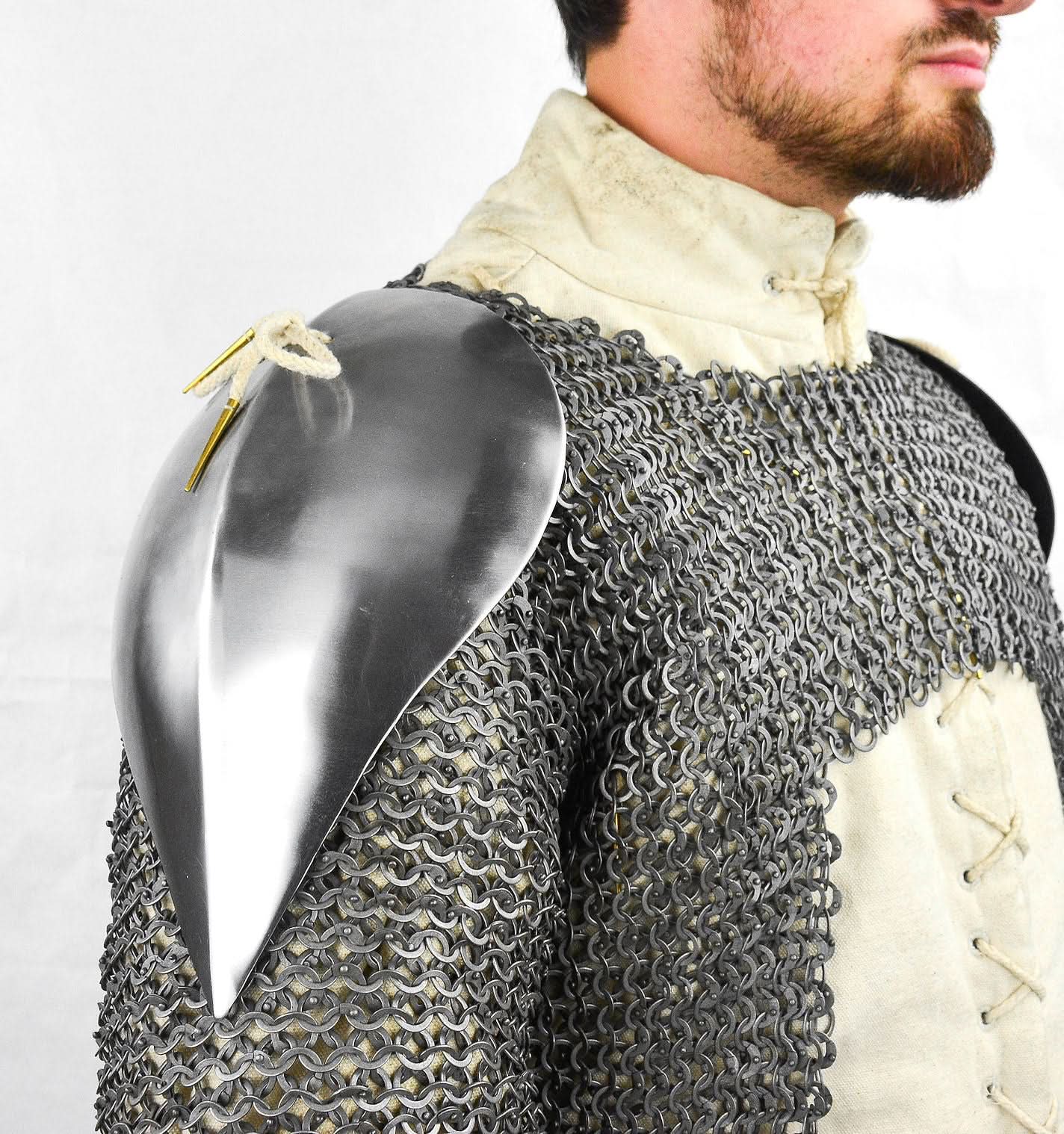man wearing Visby shoulder pauldrons