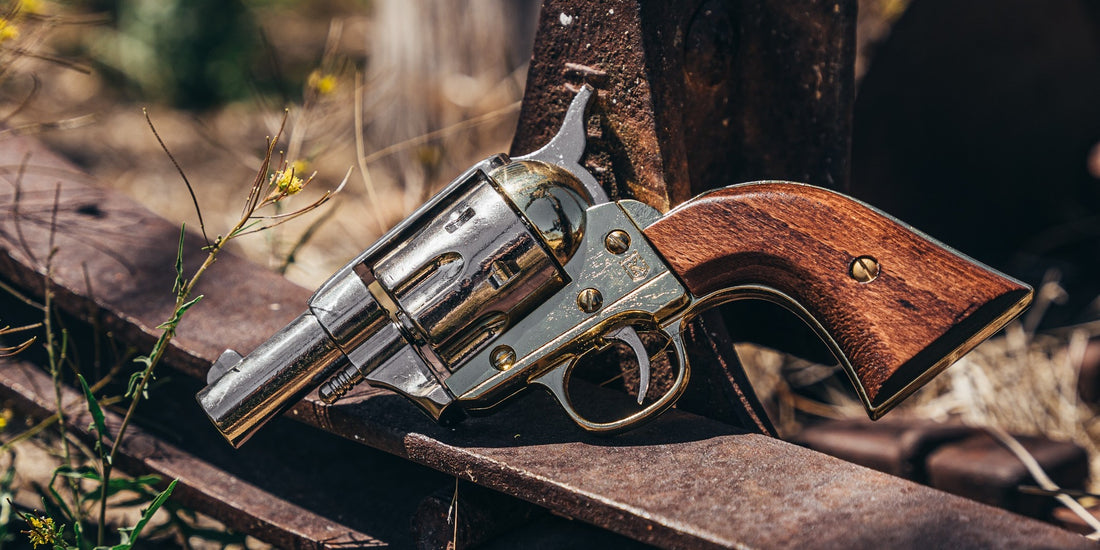 Left side of snup nose revolver with wooden grip, taken outside on a wood frame. 