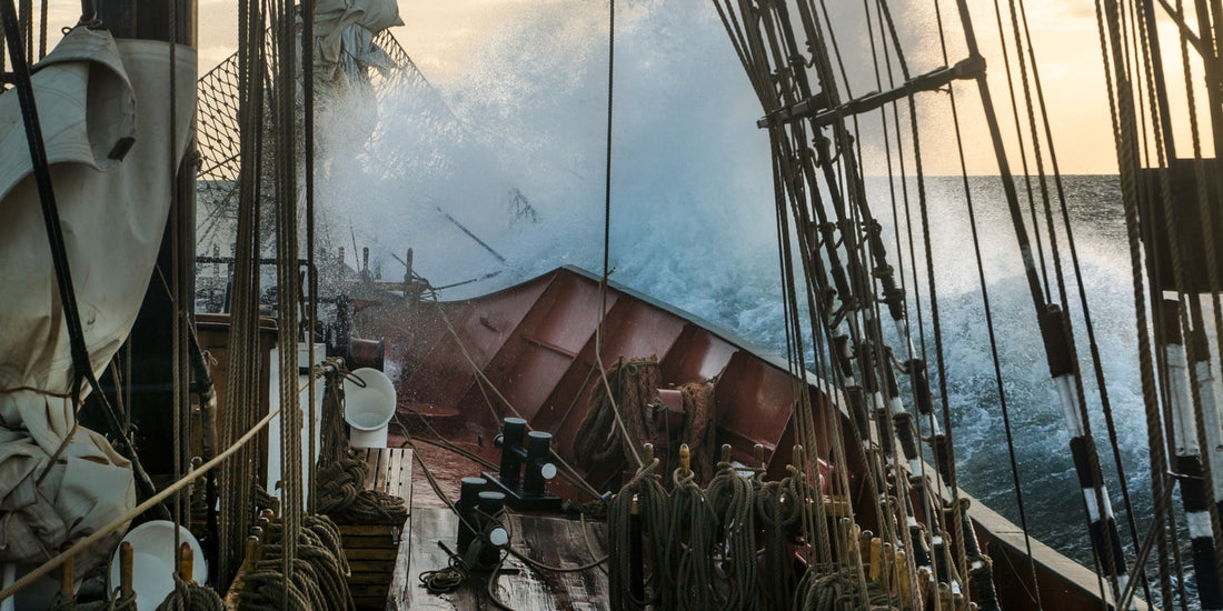Close-up picture of a pirate ship in stormy seas.