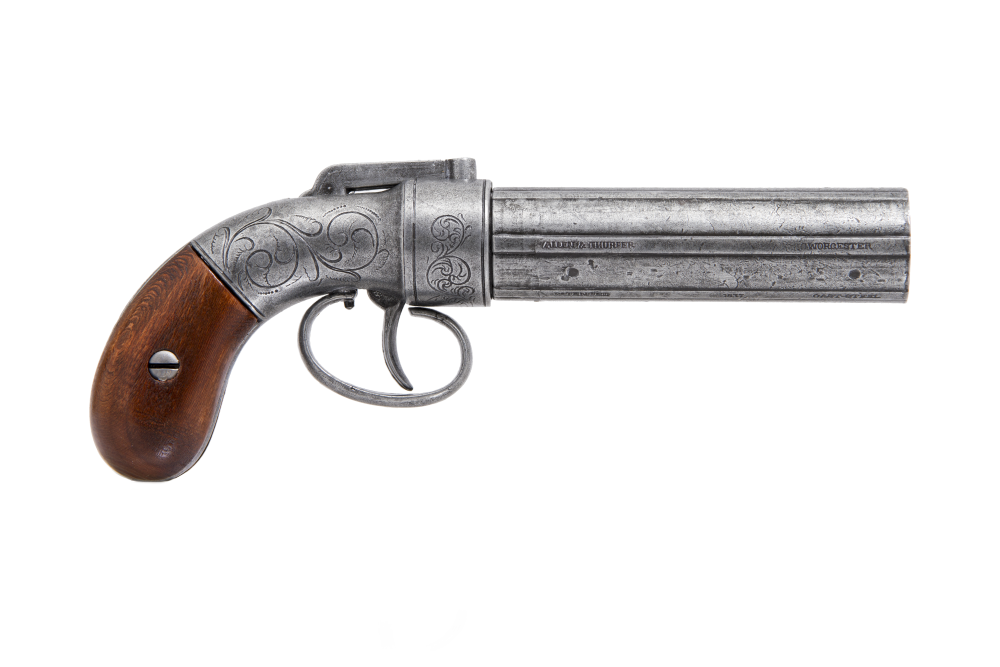 Right side view of pepperbox revolver with wooden grip. 