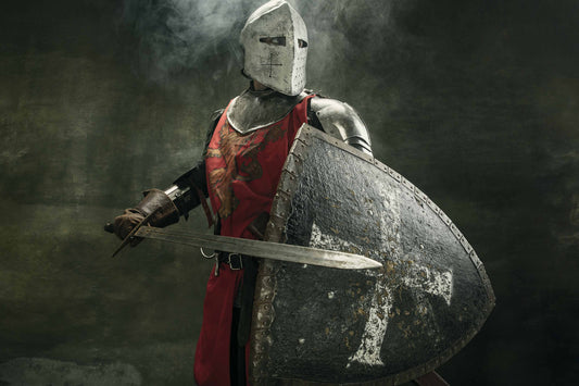 medieval knight in plate armor with sword and cross shield