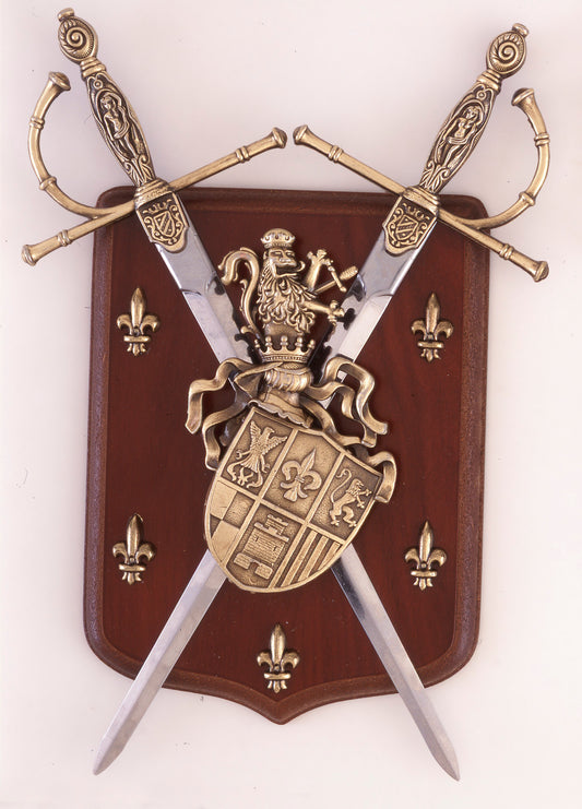 Wooden shield with crossed tizona swords and a coat of arms on top.