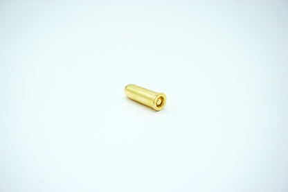 Single kolser fake bullet on its side showing the bottom
