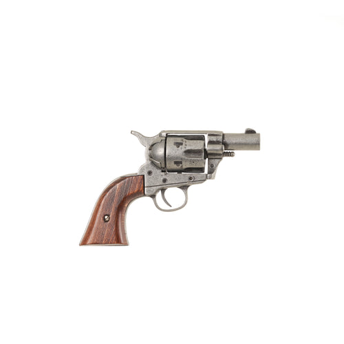 Right side view of gray Non-Firing 1873 .45 Caliber Short Revolver with striped wood grip.
