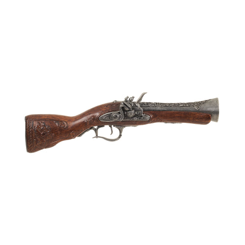 Right side view of replica 18th Century Blunderbuss with carved wood handle and decorative trigger guard, trigger, hammer, frizzen, and barrel. 