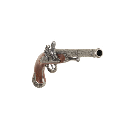 Front view of the Replica 18th Century English Lucknow Pistol with intricately carved metal mechanisms, barrel, and carved faux wood grip.