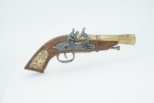 Right side of the brass, silver, and wood German flintlock pistol 