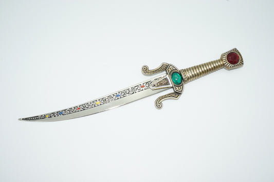 seville dagger top view with inlaid blade and faux ruby and emerald