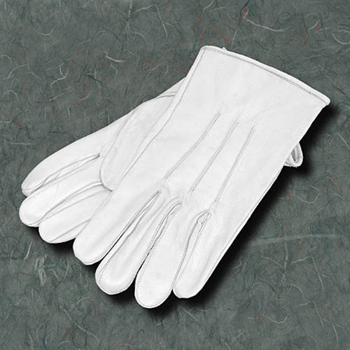 two White Leather Gloves laying on the floor