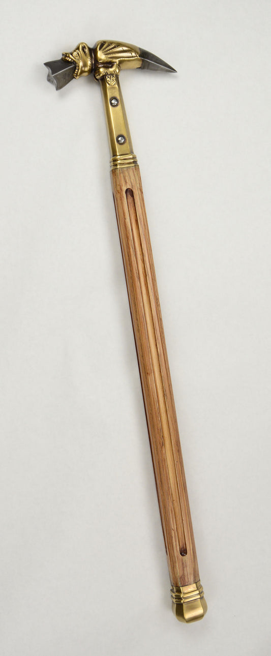 Gothic beast hammer full view with brass head and wood haft.