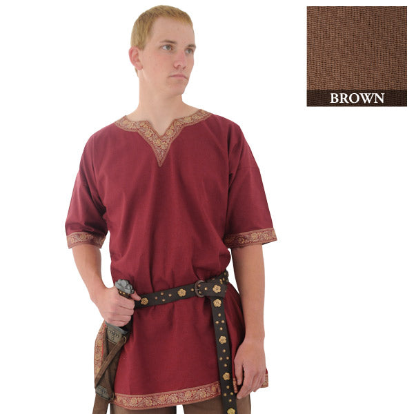 male wearing a viking shirt and holding a sword
