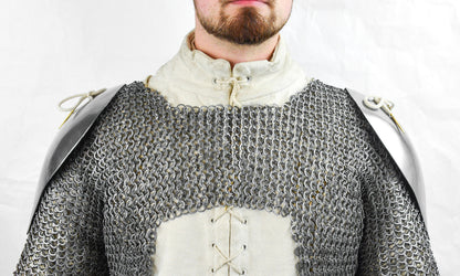 front view of a man wearing Visby shoulder pauldrons