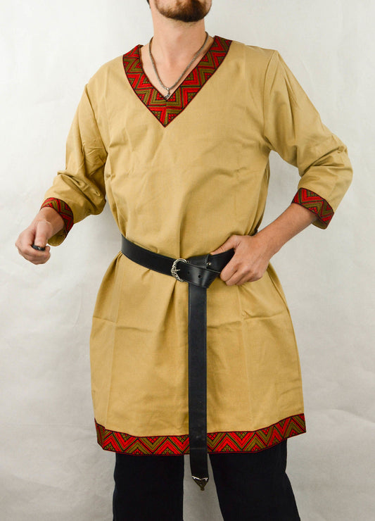 male model wearing a beige Viking Tunic