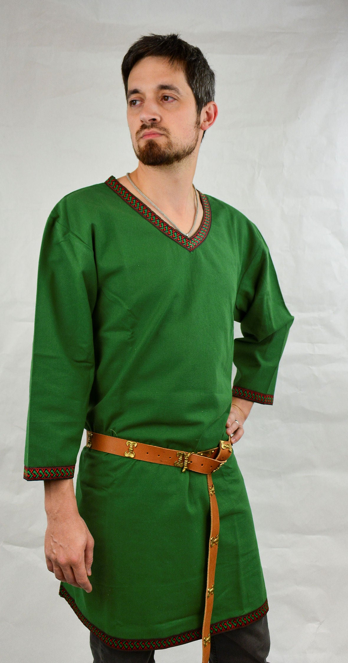 male model wearing a green Viking Tunic
