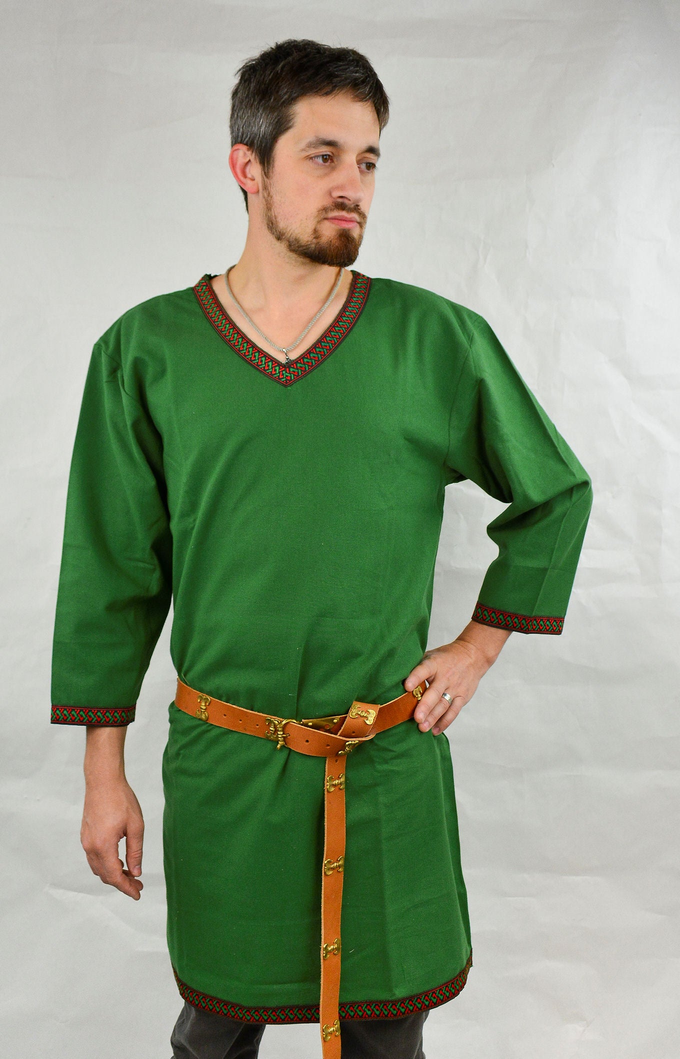 male model wearing a green Viking Tunic