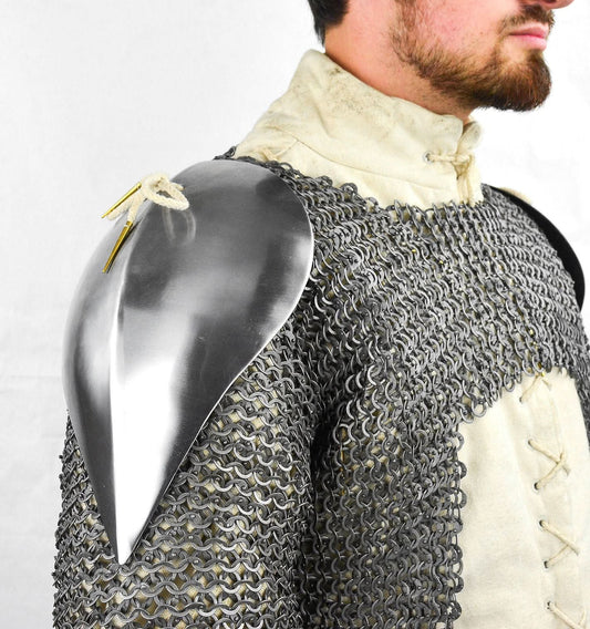 man wearing Visby shoulder pauldrons